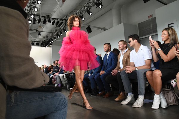 John O'Korn and Ben VanderWeide attend the Pamella Roland Spring 2019 Collection fashion show.
