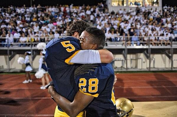 John O'Korn and Fred Coppet celebrate after St. Thomas Aquinas upsets top-ranked Manatee in the state semifinals.