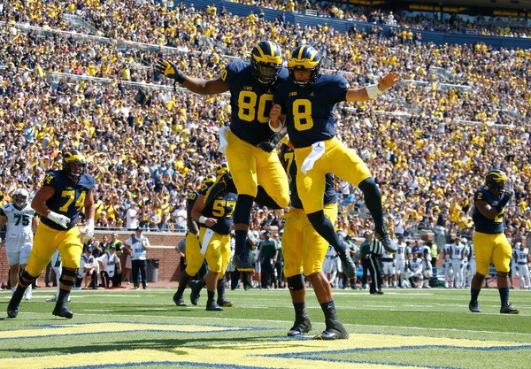 John O'Korn and Khalid Hill celebrate a touchdown during Michigan's blowout win over Hawaii.