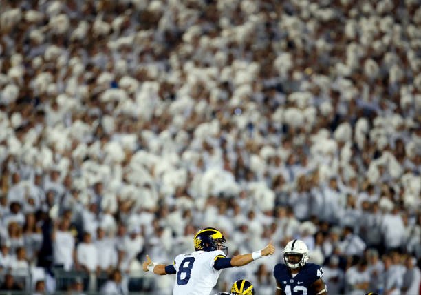 John O'Korn changes a play during a White Out game against Penn State at Beaver Stadium.
