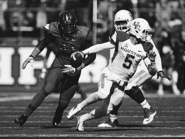 John O'Korn evades a sack against Rutgers.