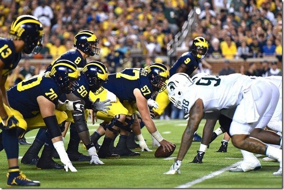 John O'Korn lines up under center against Michigan State at Michigan Stadium.
