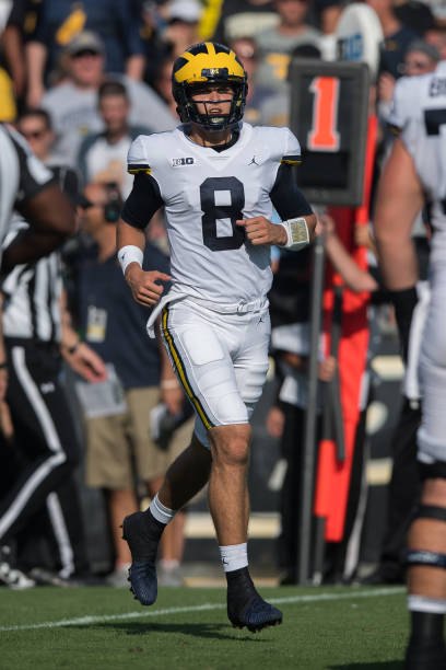 John O'Korn takes the field against Purdue.