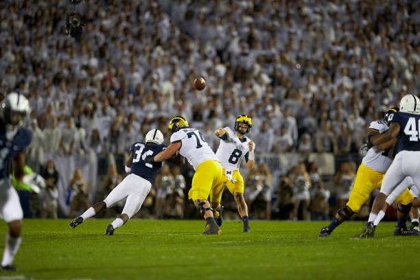 John O'Korn throws a pass against Penn State during a White Out game at Beaver Stadium.