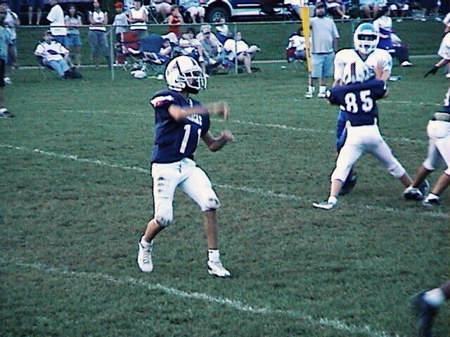 John O'Korn throws a pass for the Huntingdon Little Bearcats.