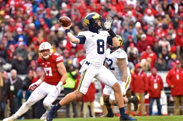 John O'Korn throws a pass during a road game at Wisconsin.