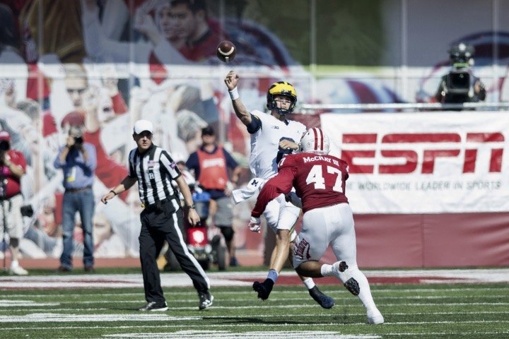 John O'Korn throws under pressure during a road game at Indiana.