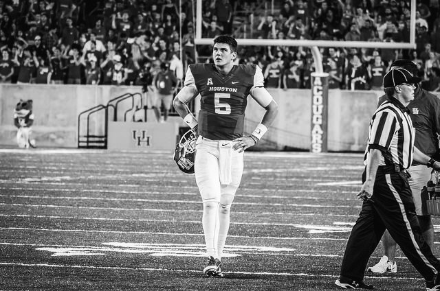 John O'Korn walks to the sideline during a Houston Cougars football game against UNLV.